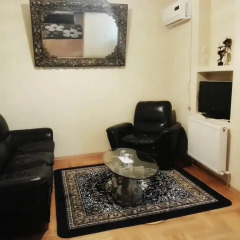Отель At Home комната для гостей