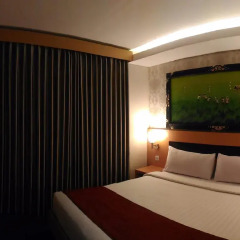 Отель Grand Puri Saron Yogyakarta 3* Номер Делюкс с различными типами кроватей фото 4