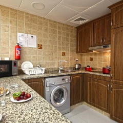 Adamo Hotel Apartments в номере
