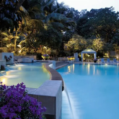 Апартаменты Shangri-La Apartments бассейн