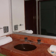 Отель Ikaro Suites Cancun Мексика, Канкун - отзывы, цены и фото номеров - забронировать отель Ikaro Suites Cancun онлайн ванная