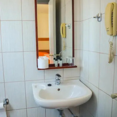 Achillion Hotel ванная