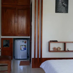 Отель CoCo Riverside Homestay Хойан удобства в номере фото 2