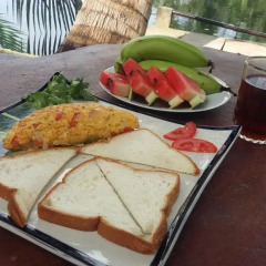 Отель CoCo Riverside Homestay Хойан питание