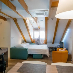 Апартаменты Apartment Atticus комната для гостей фото 2