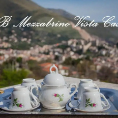 Отель Mezzabrino Vista Castello Итри в номере