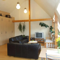 Апартаменты Sunlit Loft Apartment Riga интерьер отеля
