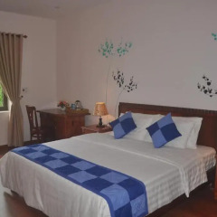 Отель Tra Que Riverside Homestay 2* Улучшенный номер с различными типами кроватей фото 11