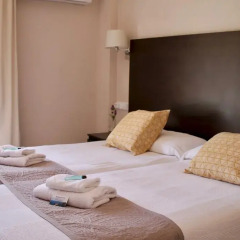 Отель Hostal Jakiton Стандартный номер с 2 отдельными кроватями