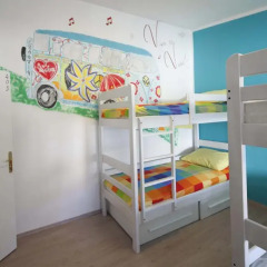 Pozitiv Hostel Кровать в общем номере с двухъярусной кроватью