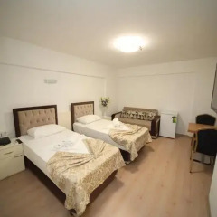 Отель Beyazköşk Otel Номер Делюкс с различными типами кроватей фото 18