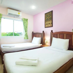 Отель Baan Sutra Guesthouse 3* Стандартный номер с 2 отдельными кроватями фото 10