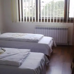 Отель Stoyanova Guest House Банско комната для гостей фото 2