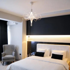 Отель TiranaTOP Suites Албания, Тирана - отзывы, цены и фото номеров - забронировать отель TiranaTOP Suites онлайн комната для гостей фото 3