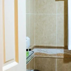 Отель Beverly Park Inn Мале ванная