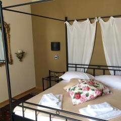 Отель Madama Cristina Bed & Breakfast комната для гостей фото 4