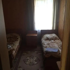 Lotos Mini hotel Домбай комната для гостей фото 3