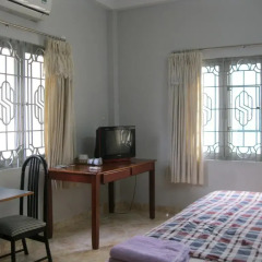 Отель Ms. Yang Homestay Стандартный семейный номер с двуспальной кроватью