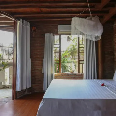 Отель Seaside An Bang Homestay 2* Улучшенный номер с различными типами кроватей фото 11