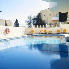 Отель AlvorMar Apartamentos Turisticos Портимао бассейн фото 3