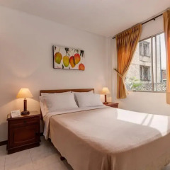 Отель Travelers Apartasuites el Peñón Колумбия, Кали - отзывы, цены и фото номеров - забронировать отель Travelers Apartasuites el Peñón онлайн комната для гостей