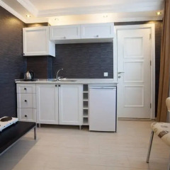 Отель Defne Suites Номер Делюкс с различными типами кроватей фото 14