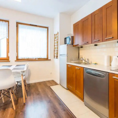 Отель Apartamenty Comfort z kominkiem, balkonem i ogrodem в номере