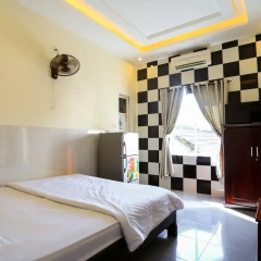 Отель Nhu Huy Homestay Номер Делюкс с различными типами кроватей фото 2
