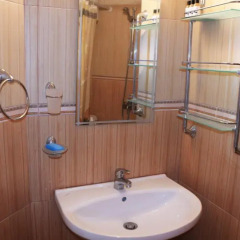 Апартаменты Kapriz Apartment ванная фото 2