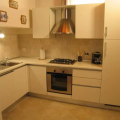 Отель Costa San Giorgio Suite в номере
