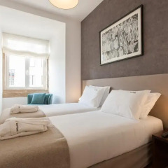 Отель Feels Like Home Rossio Prime Suites 4* Стандартный номер с 2 отдельными кроватями (общая ванная комната) фото 14