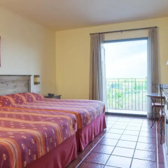 Отель PortAventura Hotel El Paso - Theme Park Tickets Included Испания, Салоу - 12 отзывов об отеле, цены и фото номеров - забронировать отель PortAventura Hotel El Paso - Theme Park Tickets Included онлайн комната для гостей фото 3
