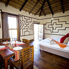 Отель Addo Palace Bush Huts в номере
