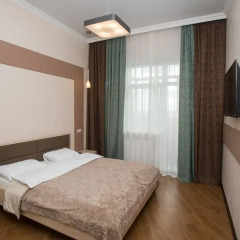 Апартаменты Apartment Malygina Тюмень комната для гостей фото 4
