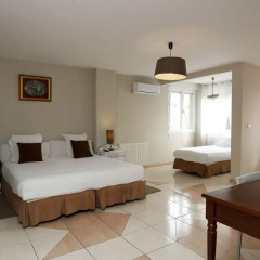 Отель Escala Suites Стандартный номер с различными типами кроватей фото 8