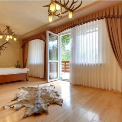 Отель udanypobyt Apartament Myśliwski Косцелиско комната для гостей фото 4