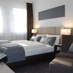Dom Hotel Am Römerbrunnen 3* Номер Делюкс с различными типами кроватей фото 6