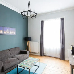 Отель Urban Suites Brussels EU Улучшенные апартаменты с различными типами кроватей