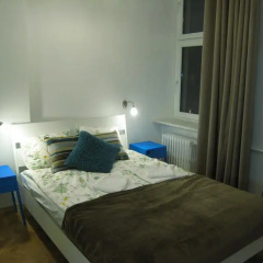 Отель Accommodo Boduena One Bedroom Apartment Польша, Варшава - отзывы, цены и фото номеров - забронировать отель Accommodo Boduena One Bedroom Apartment онлайн комната для гостей фото 4