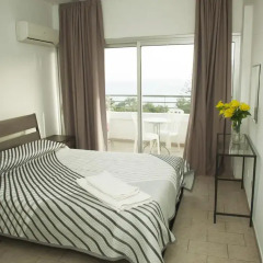Апартаменты Anemos Apartments комната для гостей фото 5