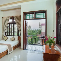 Отель Tra Que Flower Homestay Стандартный номер с двуспальной кроватью фото 12
