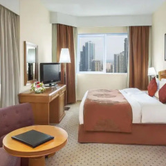 Отель Golden Tulip Sharjah Представительский люкс с различными типами кроватей фото 10