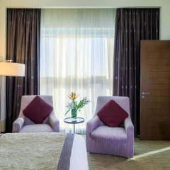 Отель Grand Millennium Al Wahda 5* Улучшенный номер с различными типами кроватей фото 2
