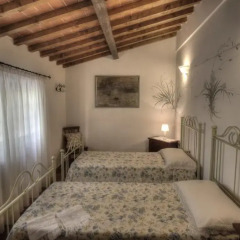 Отель Villaggio Paradiso casa vacanze Монтеварчи комната для гостей