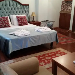 Апартаменты Tashkonak Sultan Suites and Apartments Люкс с различными типами кроватей фото 21