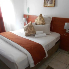 Отель Broadhurst Inn Габороне комната для гостей фото 5