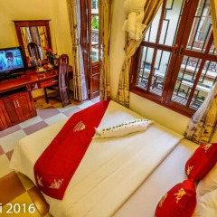 Отель Nhi Nhi 3* Номер Делюкс фото 5