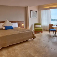 Отель Las Brisas Huatulco 4* Улучшенный номер с различными типами кроватей фото 4