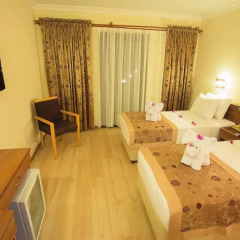 Отель Liberty Hotels Oludeniz 4* Стандартный семейный номер с двуспальной кроватью фото 3