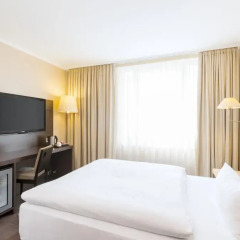 Отель NH Collection Berlin Mitte Am Checkpoint Charlie 4* Стандартный номер с разными типами кроватей фото 7